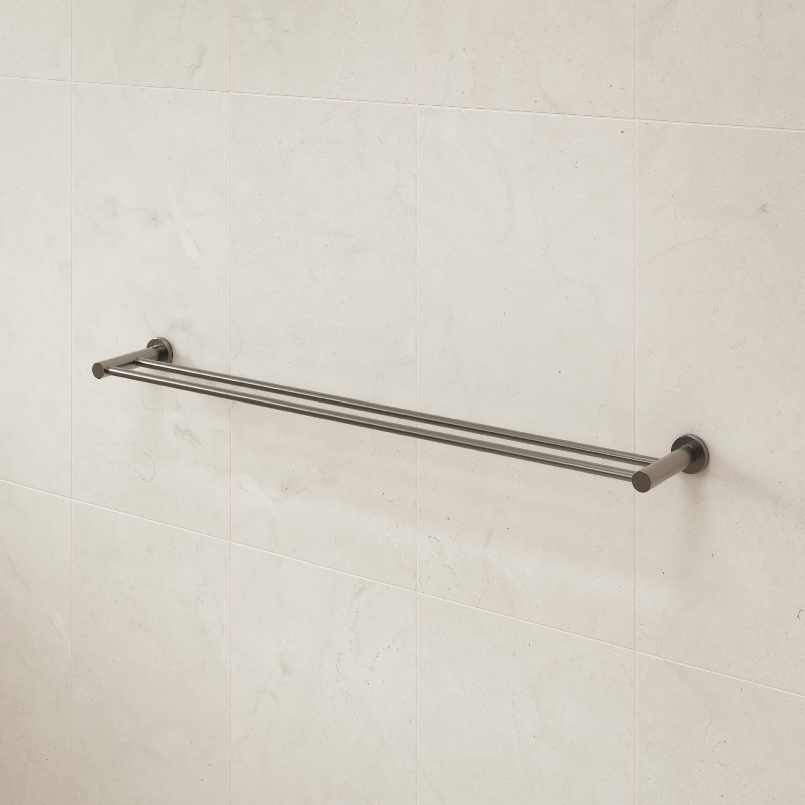 Caroma Liano II double towel rail in gunmetal, mounted on a tiled bathroom wall