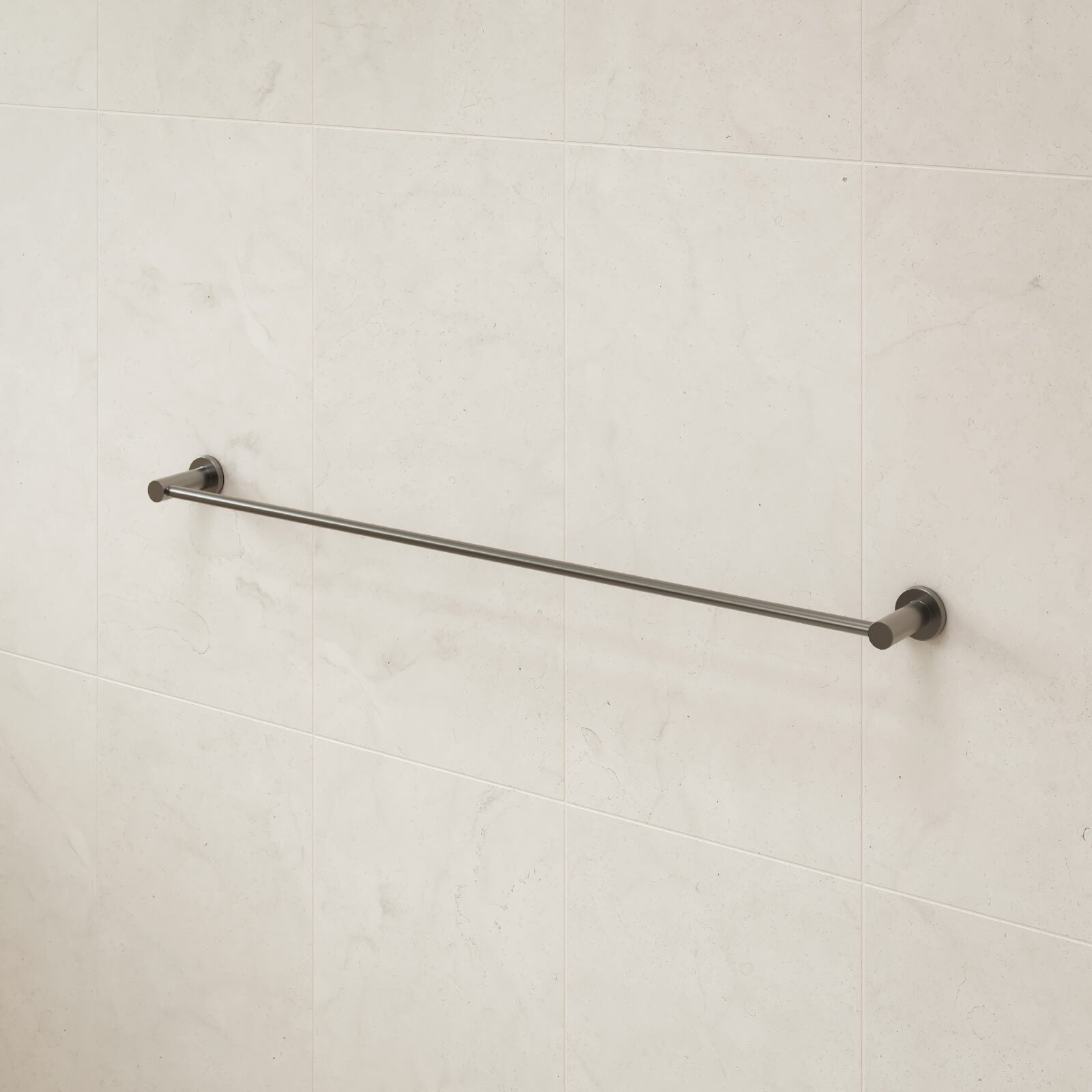 Caroma Liano II single towel rail in gunmetal, mounted on a tiled bathroom wall, shown in side view.