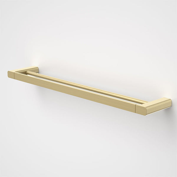 Caroma Luna double towel rail in brushed brass, 630mm, with clean modern lines on a white background