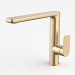 Caroma Luna II sink mixer in brushed brass, side view with flat spout and single lever handle
