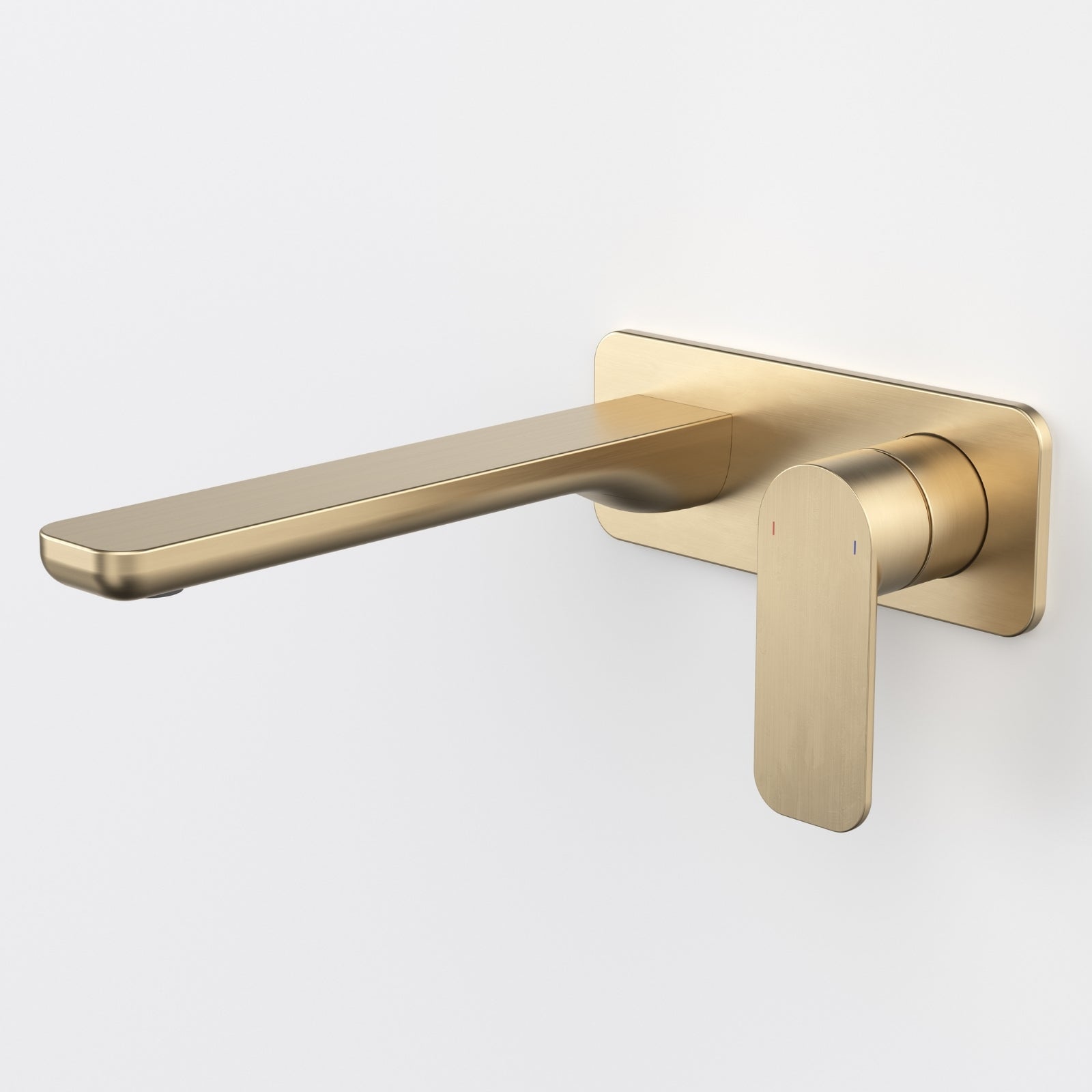 Caroma Luna II wall basin/bath mixer in brushed brass, with long spout and slim lever on a rectangular backplate