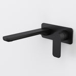 Caroma Luna II wall basin/bath mixer in satin black, wall-mounted with long spout and lever handle