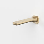 Caroma Luna II wall basin/bath outlet in brushed brass, wall-mounted spout, side view on white background