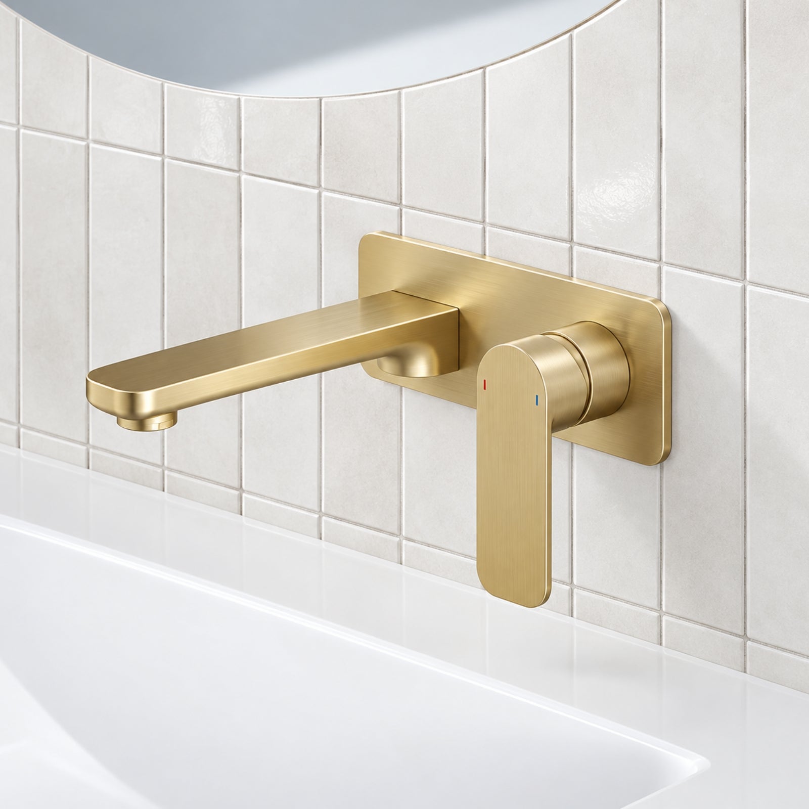 Caroma Luna wall basin/bath mixer in brushed brass, mounted above a bath against white tiled wall