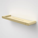 Caroma Luna brushed brass metal bathroom shelf with wall-mounted rectangular tray and raised edges