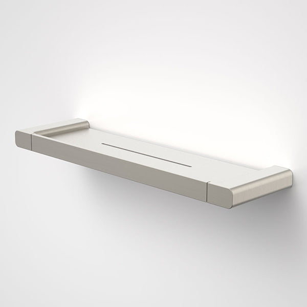 Caroma Luna brushed nickel metal bathroom shelf with concealed fixings, wall-mounted on a plain white background