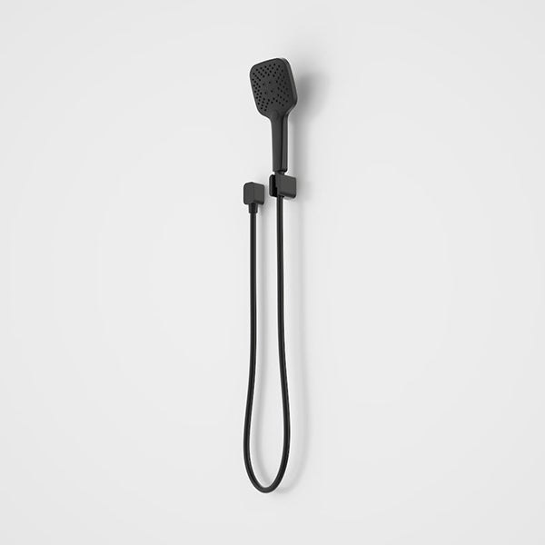 Caroma Luna black multifunctional square hand shower with hose and wall bracket, shown front on against a white background