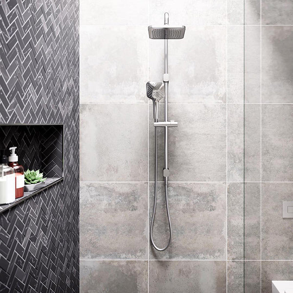 Caroma Luna twin shower on rail in chrome, with square overhead shower and handheld set against grey bathroom tiles