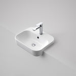 Caroma Luna semi recessed basin in white, rectangular ceramic with chrome mixer tap on a vanity bench