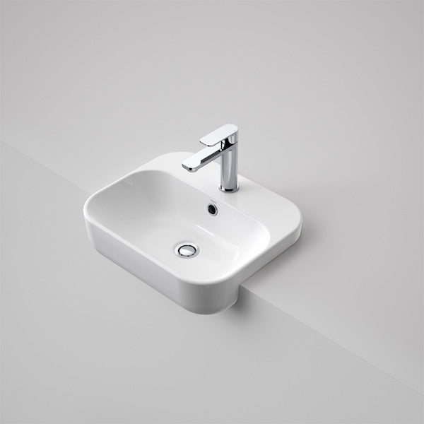 Caroma Luna semi recessed basin in white, rectangular ceramic with chrome mixer tap on a vanity bench