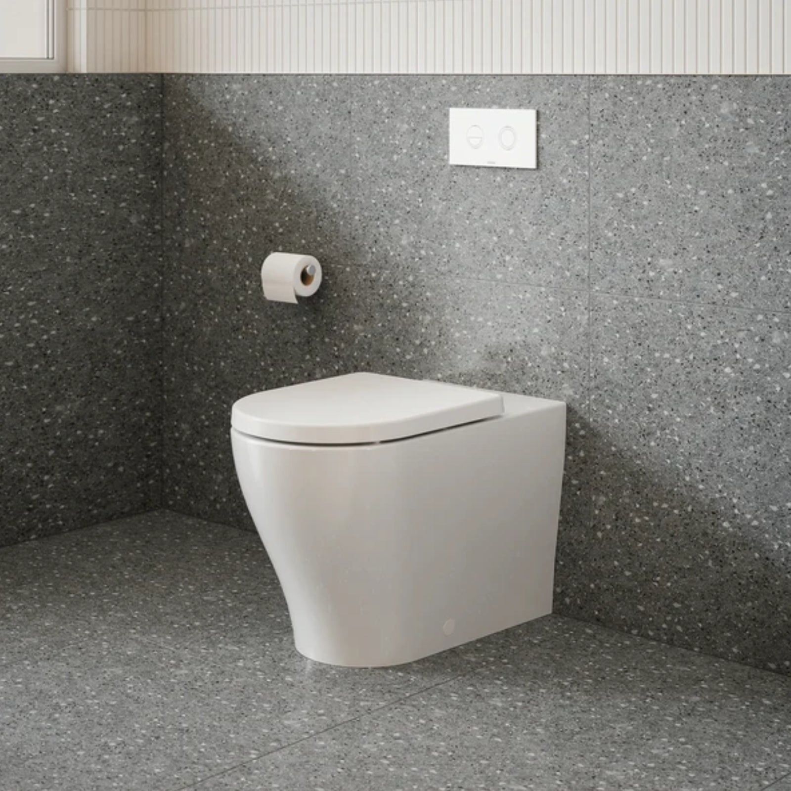 Caroma Luna Slim wall-faced toilet suite in white, shown in a modern bathroom with concealed cistern and flush plate