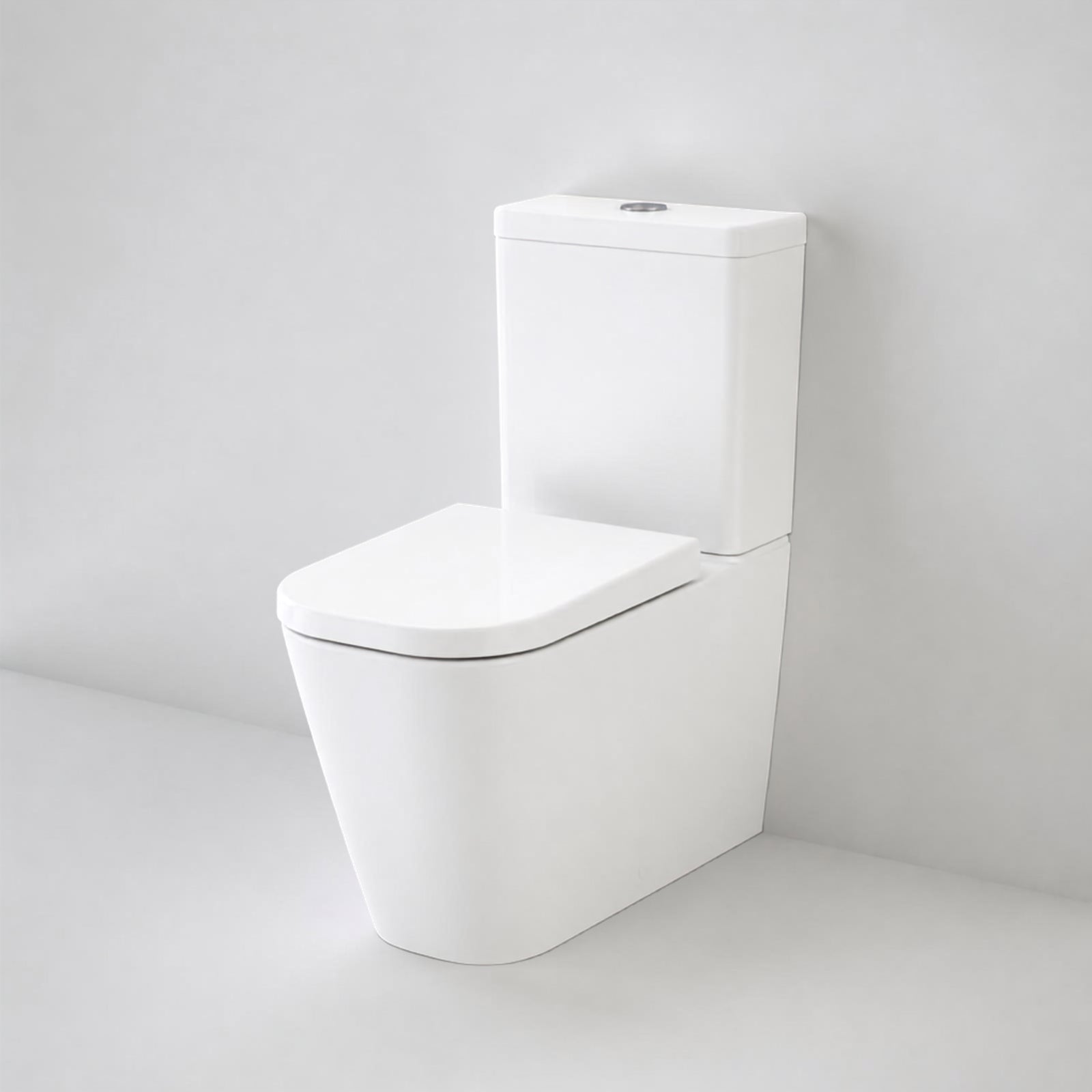 Caroma Luna Square back-to-wall toilet suite in white, with square cistern and closed seat in studio view