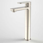 Caroma Luna tower basin mixer in brushed nickel, tall hob-mounted tap with paddle handle and curved spout