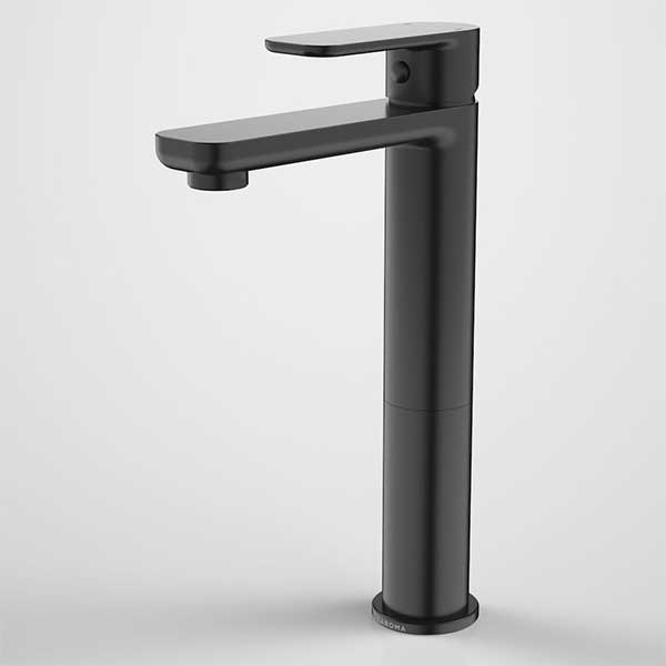 Caroma Luna black tower basin mixer tap with tall cylindrical body and slim spout, side view on white background