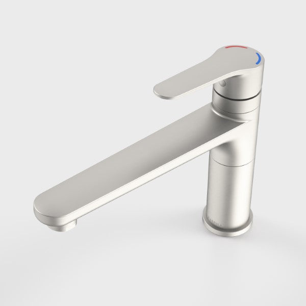 Caroma Opal sink mixer tap in brushed nickel, with assistive lever handle and tower body on white background