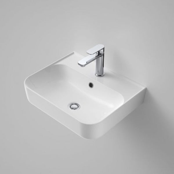 Caroma Tribute white wall hung basin 500mm, rectangular ceramic basin with chrome mixer tap on grey background