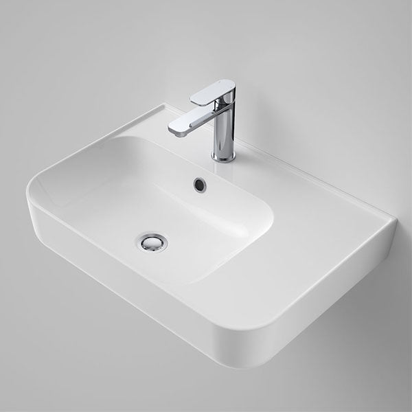 Caroma Tribute white rectangular wall basin with right-hand shelf and single tap hole, angled view