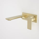 Caroma Urbane II wall basin/bath mixer in brushed brass with rectangular spout and lever handle