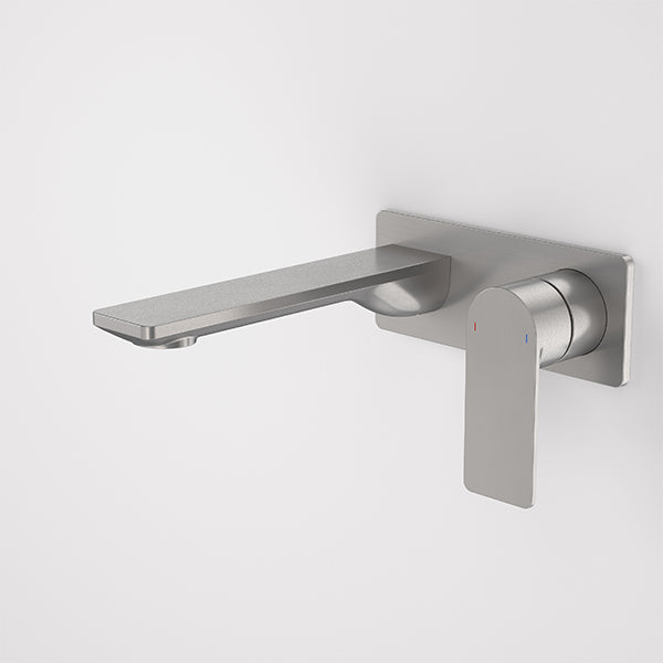 Caroma Urbane II wall basin/bath mixer with rectangular spout in gunmetal, shown against a white wall