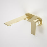 Caroma Urbane II wall basin/bath mixer in brushed brass, round lever design on a wall plate