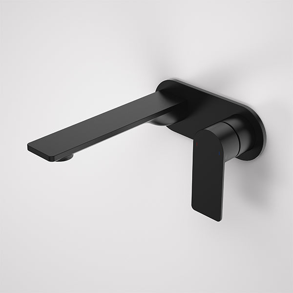 Caroma Urbane II wall basin/bath mixer in matte black, with round wall plate and extended spout