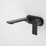 Caroma Urbane II wall basin/bath mixer in matte black, round wall-mounted tap with lever handle and long spout
