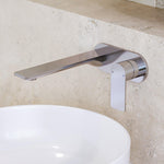 Caroma Urbane II wall basin/bath mixer in chrome, with slim round wall-mounted spout over a basin.