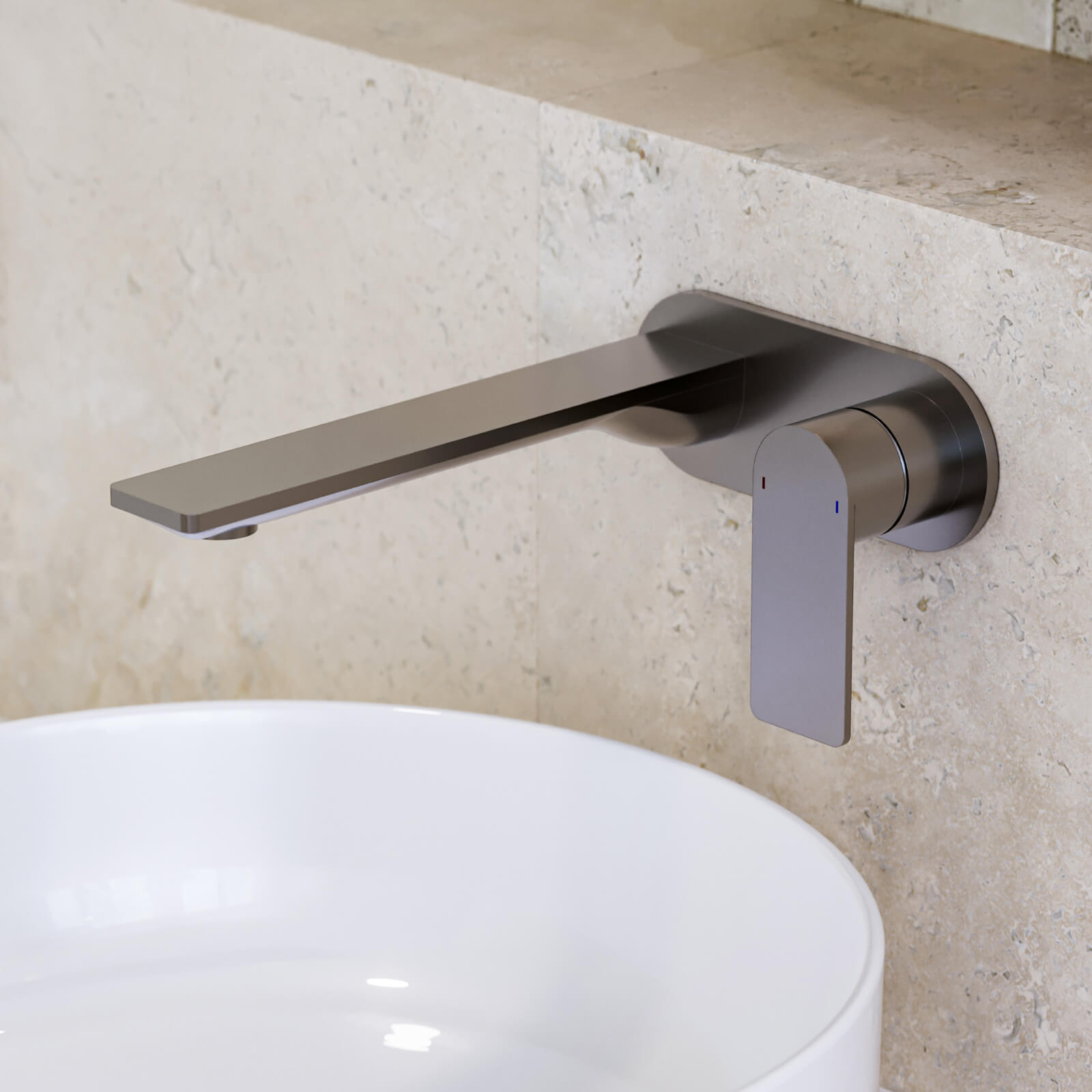 Caroma Urbane II wall basin mixer in gunmetal, round wall-mounted tap with flat spout over a white basin
