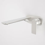 Caroma Urbane II wall basin/bath mixer in brushed nickel with round wall plate and long spout