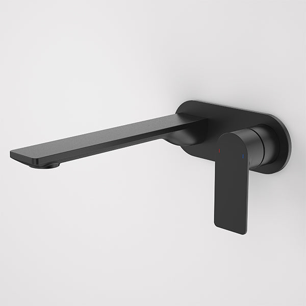 Caroma Urbane II wall basin mixer in matte black, round wall-mounted tap with long spout and lever handle