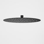 Caroma 300mm round matte black rain shower head, front view, slim low-profile design with silicone nozzles