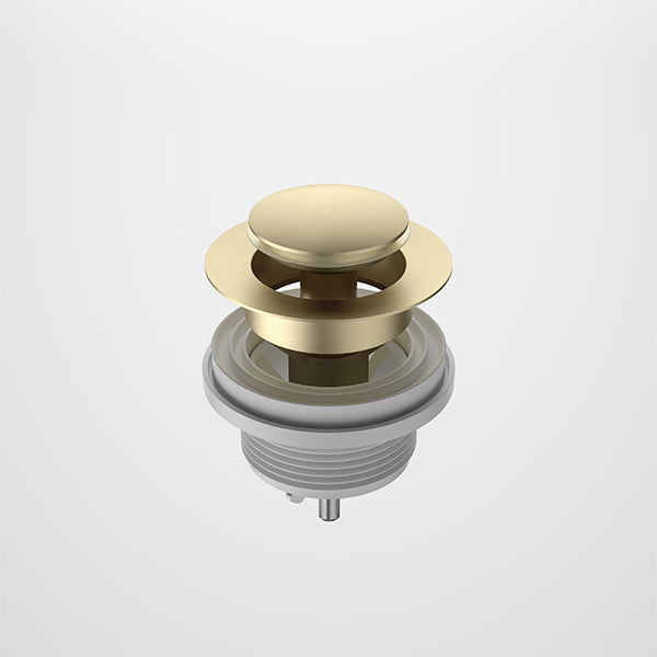 Caroma round bath pop-up plug & waste in brushed brass, shown on white background