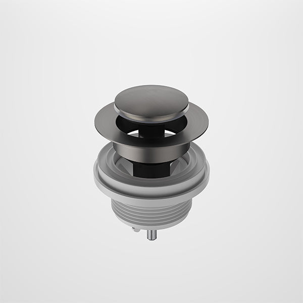 Caroma round pop-up bath/basin plug and waste in gunmetal, compact 40mm fitting on white background