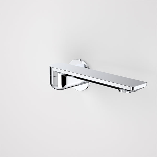 Caroma Urbane II chrome round bath swivel outlet, wall-mounted with long rectangular spout and circular backplate.