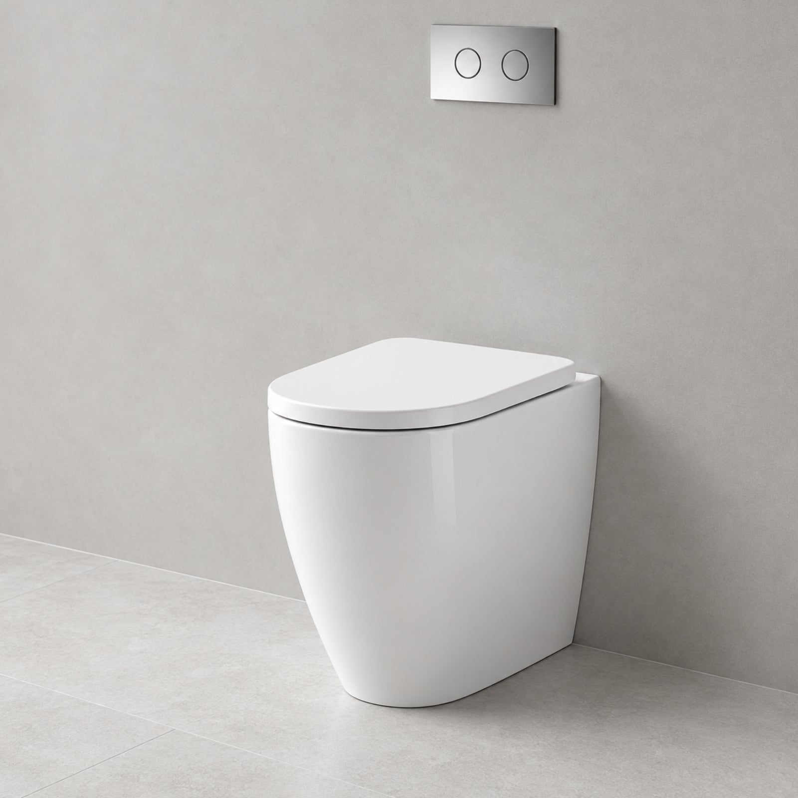 Caroma Urbane II white compact wall faced toilet suite with concealed cistern and dual flush buttons, angled view