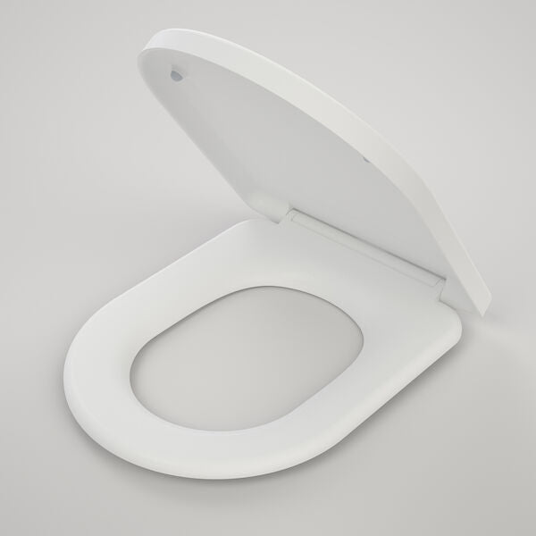 Caroma Urbane II white toilet seat with lid, soft-close, shown open in angled view on a plain background