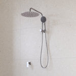 Caroma Urbane II compact twin shower in chrome, wall-mounted with round overhead shower and hand shower on rail