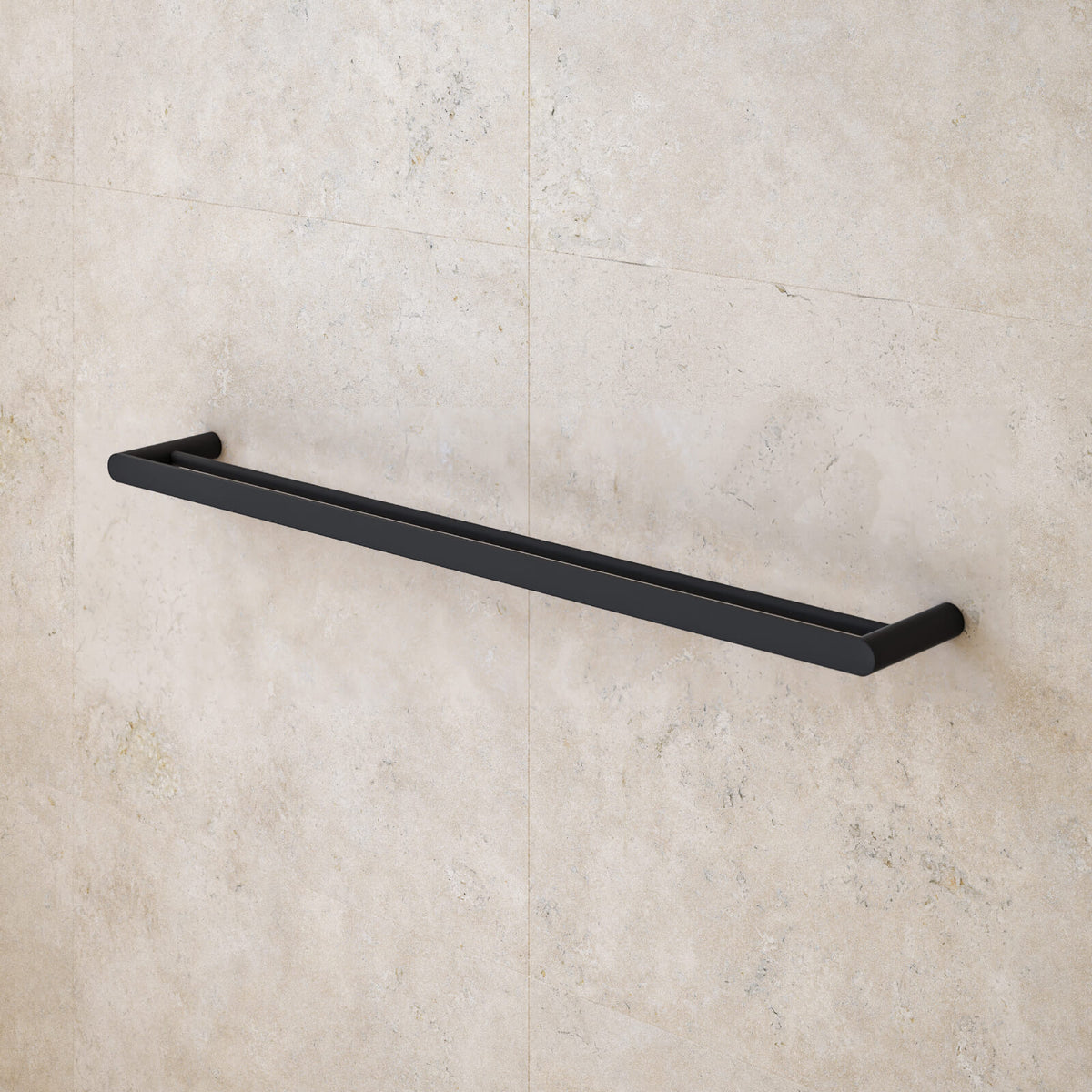 Caroma Urbane II matte black double towel rail mounted on a tiled bathroom wall, angled view