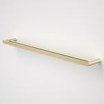 Caroma Urbane II double towel rail in brushed brass, 825mm, wall-mounted on a white background