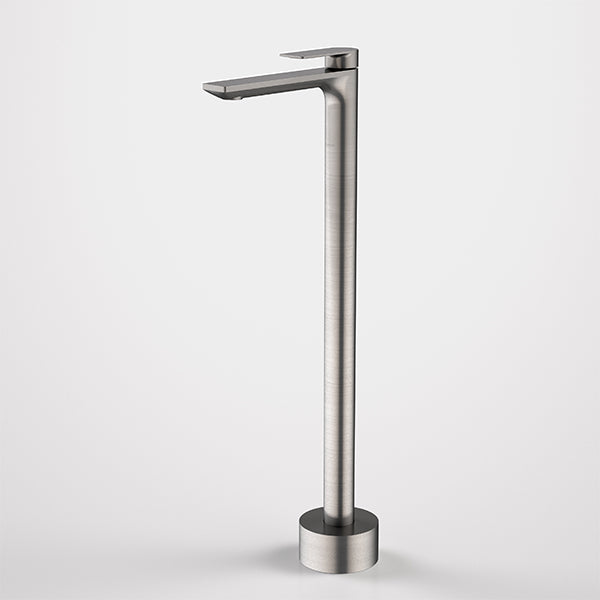Caroma Urbane II freestanding bath filler tap in gunmetal, floor-mounted with rectangular spout and slim column