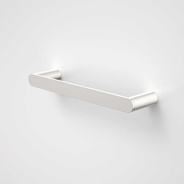 Caroma Urbane II brushed nickel hand towel rail with slim rounded wall mounts on a white background