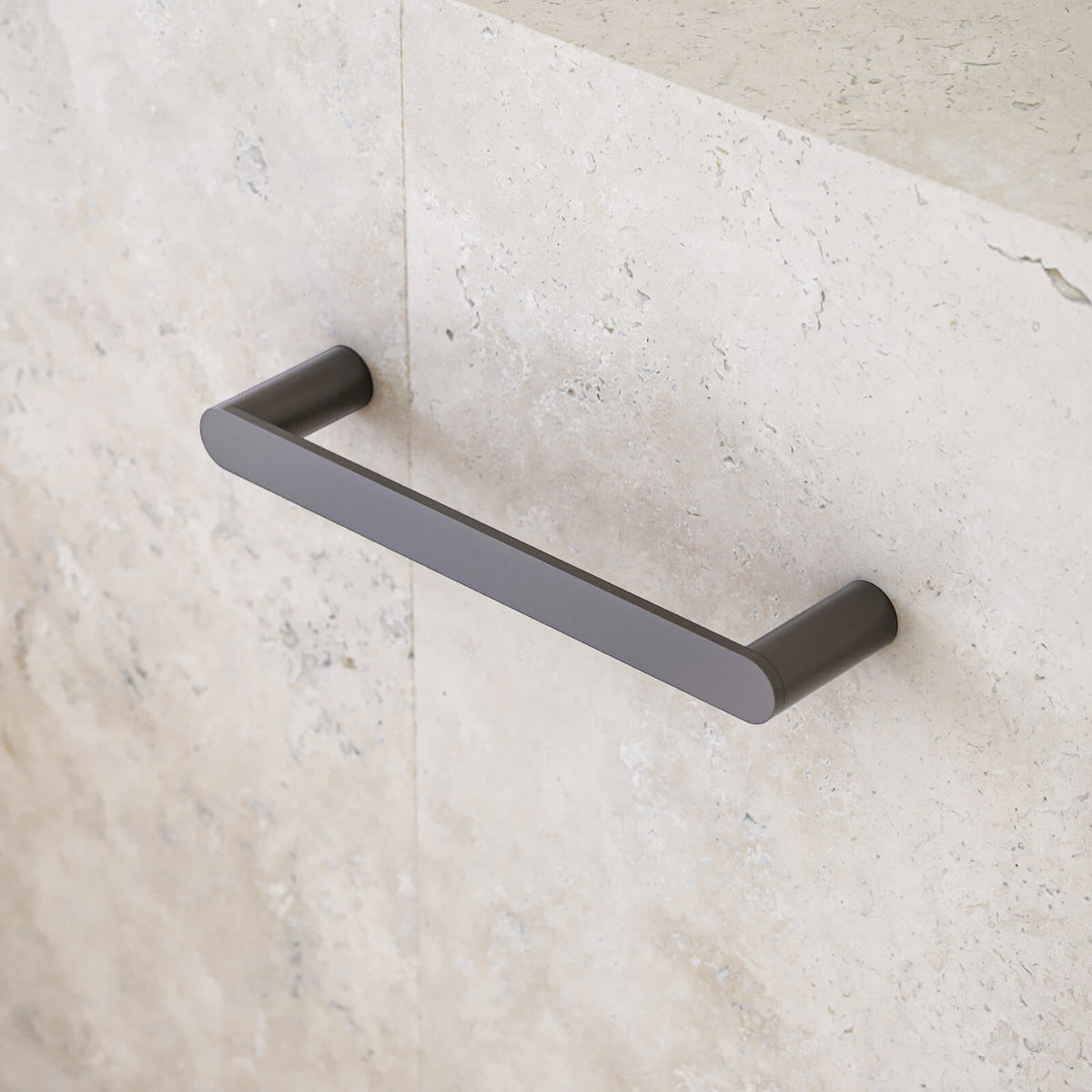 Caroma Urbane II gunmetal hand towel rail, wall-mounted in a modern bathroom, straight rectangular bar finish