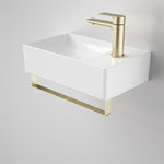 Caroma Urbane II gloss white wall-hung hand basin with single tap hole and gold integrated rail