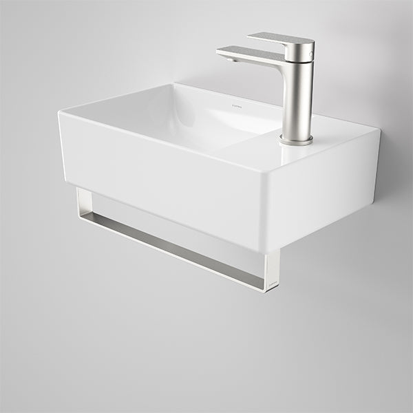 Caroma Urbane II gloss white wall hung hand basin with single taphole and silver mixer tap, rectangular view