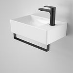 Caroma Urbane II wall hung hand basin, gloss white rectangular ceramic with black mixer tap and rail