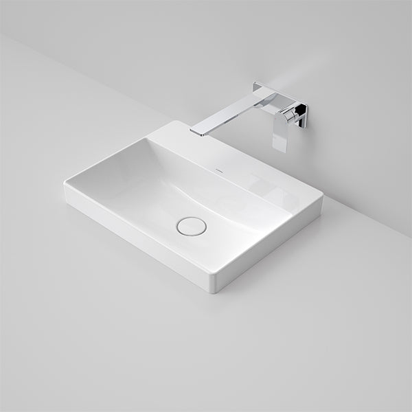 Caroma Urbane II white rectangular inset basin with tap landing and chrome wall mixer, angled bathroom view