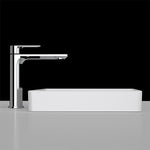 Caroma Urbane II white rectangular inset bathroom basin with no tap landing, shown with chrome mixer tap on benchtop