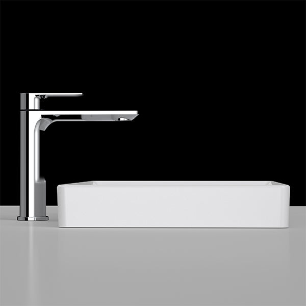 Caroma Urbane II white rectangular inset bathroom basin with no tap landing, shown with chrome mixer tap on benchtop