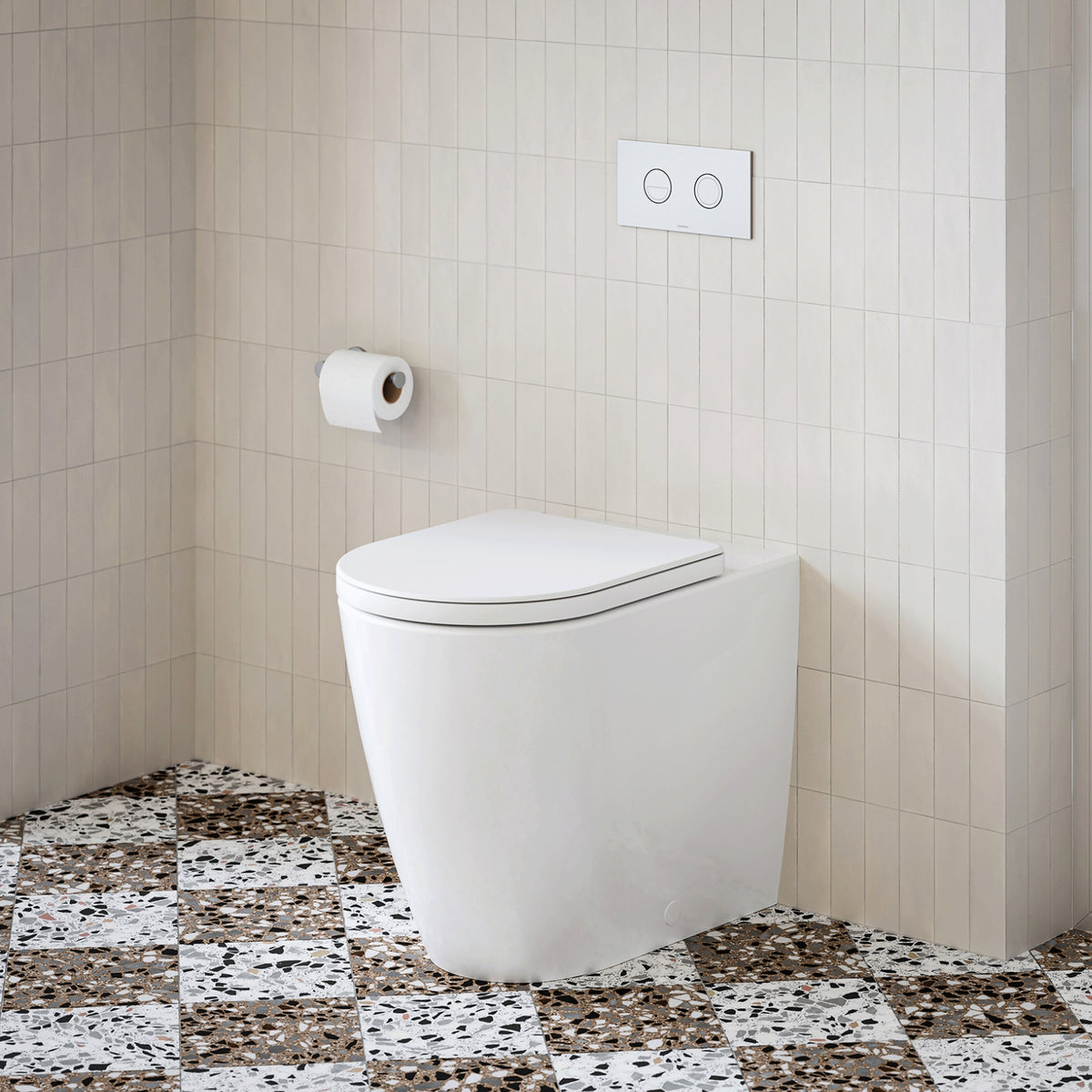 Caroma Urbane II Luxe wall-faced toilet suite in white with concealed cistern and flush plate in a tiled bathroom.