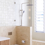 Caroma Urbane II chrome twin rail shower with overhead rose and handheld spray in a modern bathroom